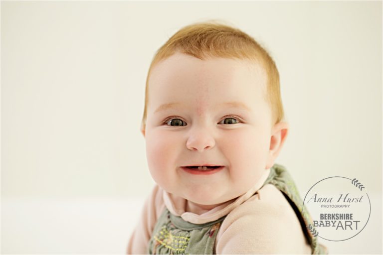 Young Baby Smiling at Camera